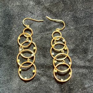 New, Fish hook, 14kt yellow gold, peridots and Topazes stones Value US $529